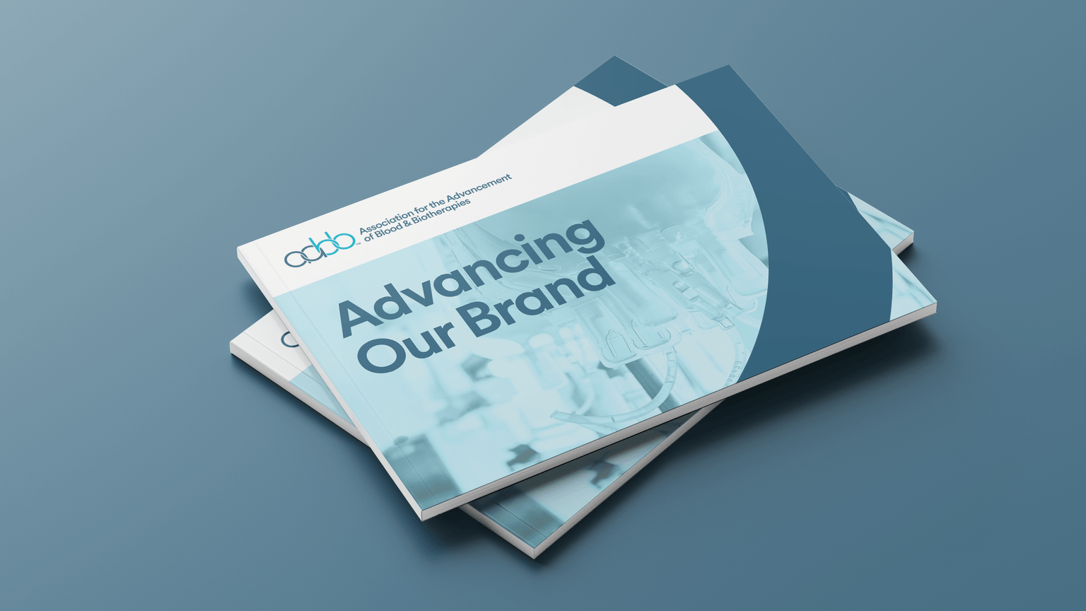 Picture of a stack of brochures titled "Advancing Our Brand"